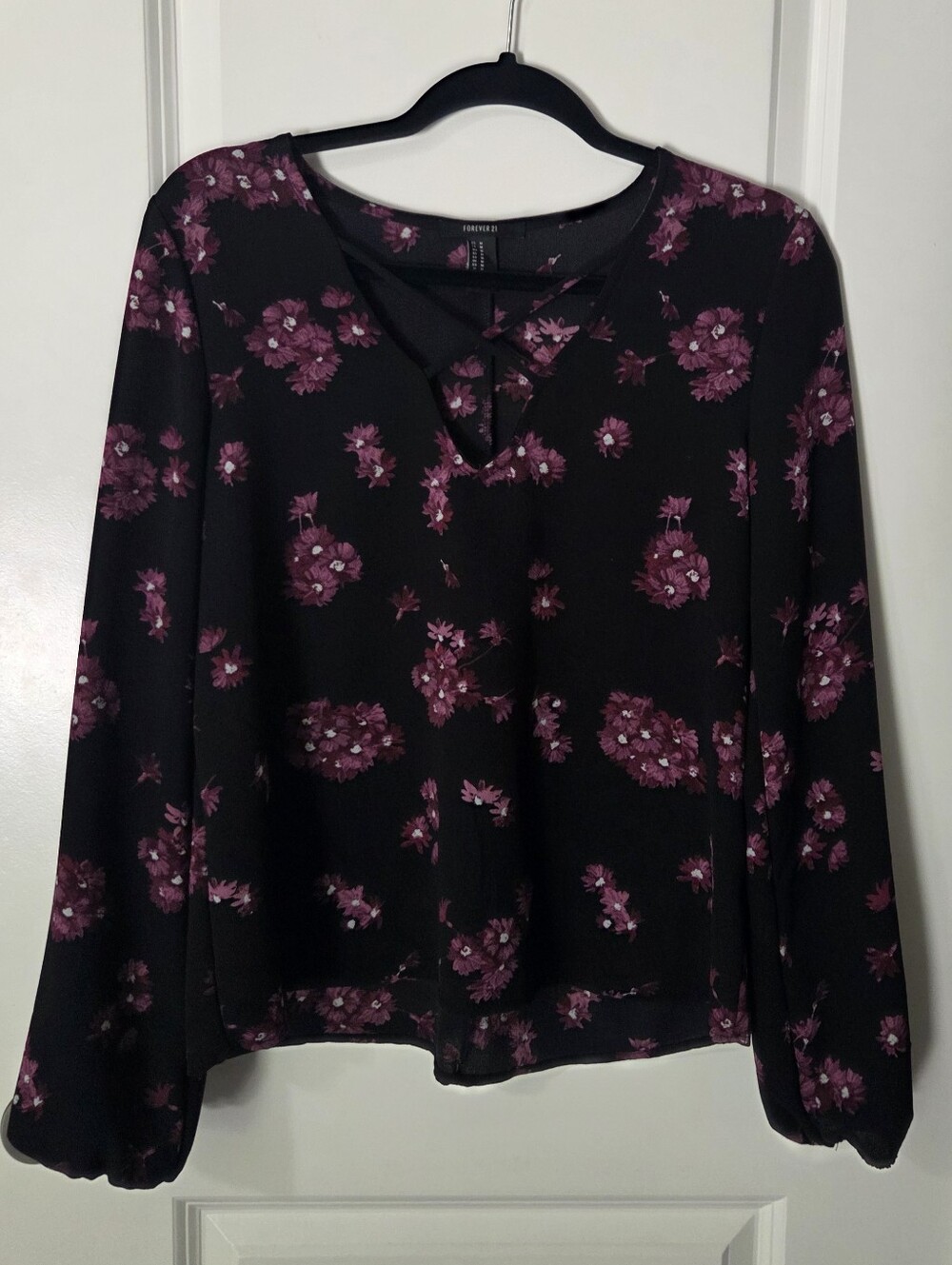 Women’s Black Floral Long-Sleeve V-Neck Top with Crisscross Detail